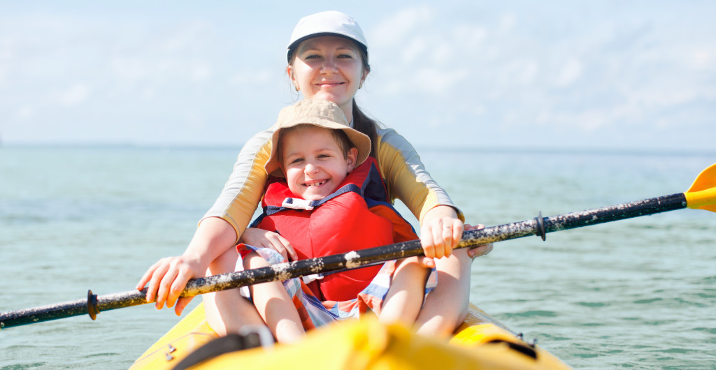 Mother and son kayaking